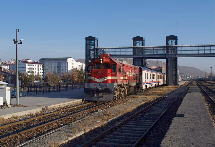 Red and white Dogu Express train at Kars station