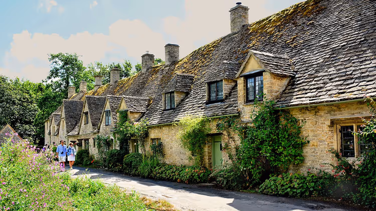 Alignée de chaumières en pierre d'Arlington Row à Bibury