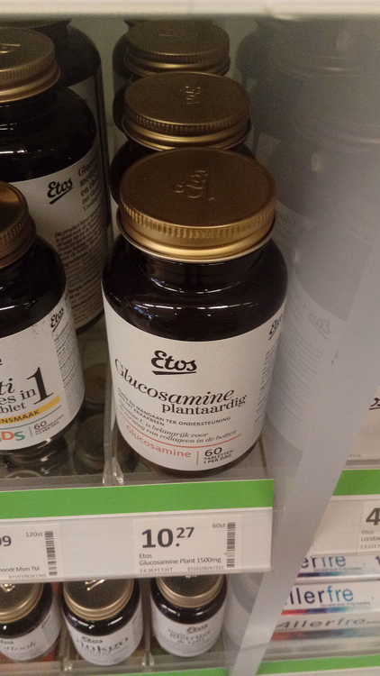 Glucosamine jar on a pharmacy shelf