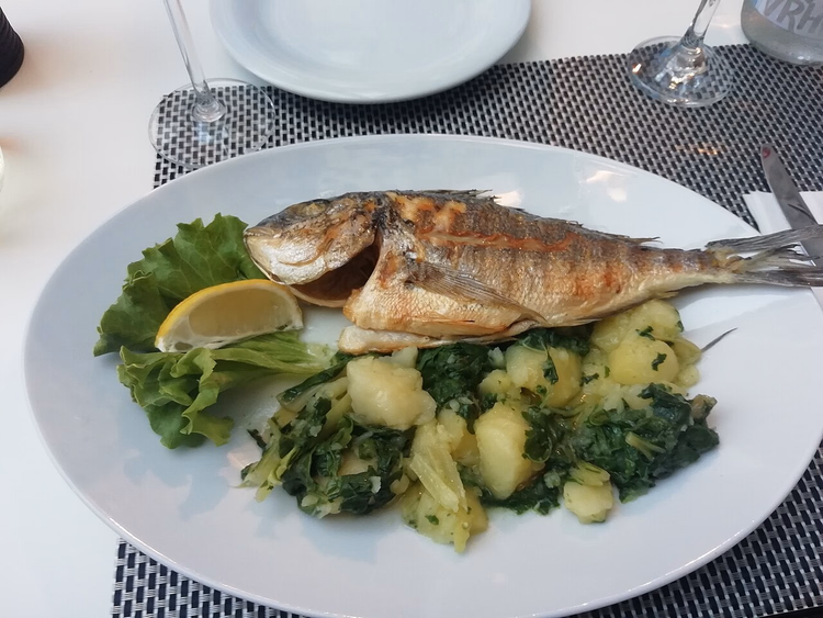 Grilled sea bream with Swiss chard and lemon