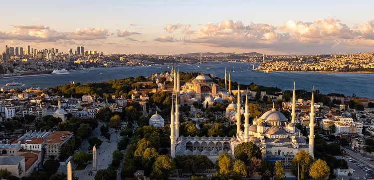 Panorama of Istanbul with mosques and the Bosphorus at sunset