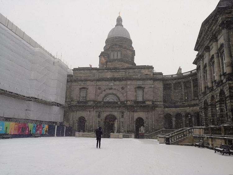 Snow-covered Old College quad in Edinburgh