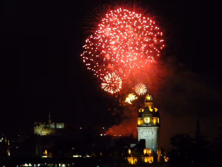 Midnight fireworks above Edinburgh Castle and Princes Street