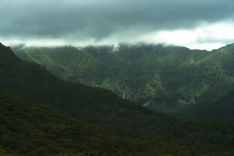 Mount Waialeale in the clouds with waterfalls