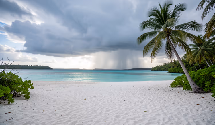 Tropical beach between brief rain showers