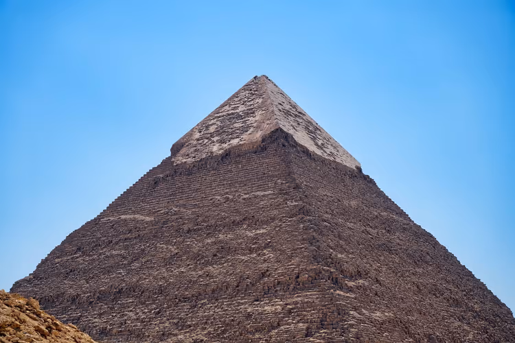 Great Pyramid of Giza against a blue sky