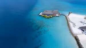Чем заняться в Four Seasons Kuda Huraa: серфинг, виллы и трансфер