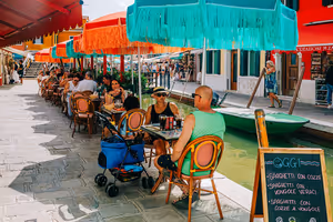Hvor du kan spise med barn på ferie: fra en pizzeria i Roma til et bakeri på Hawaii
