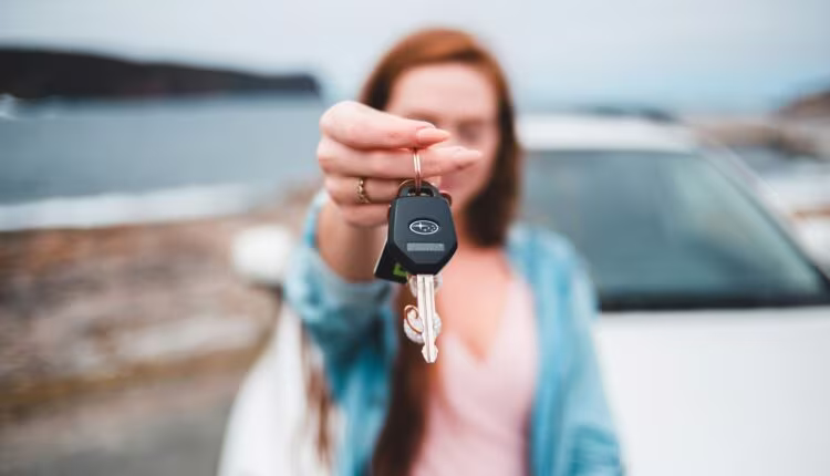 focus photography of black vehicle key