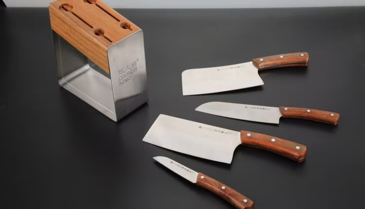 brown wooden handled knife on white chopping board