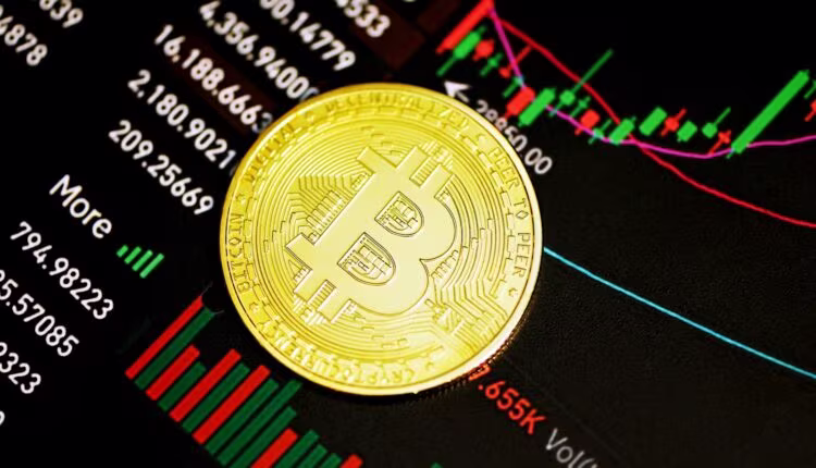 gold round coin on black surface