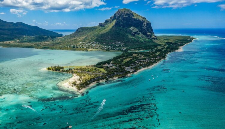 aerial photography of island beside body of water