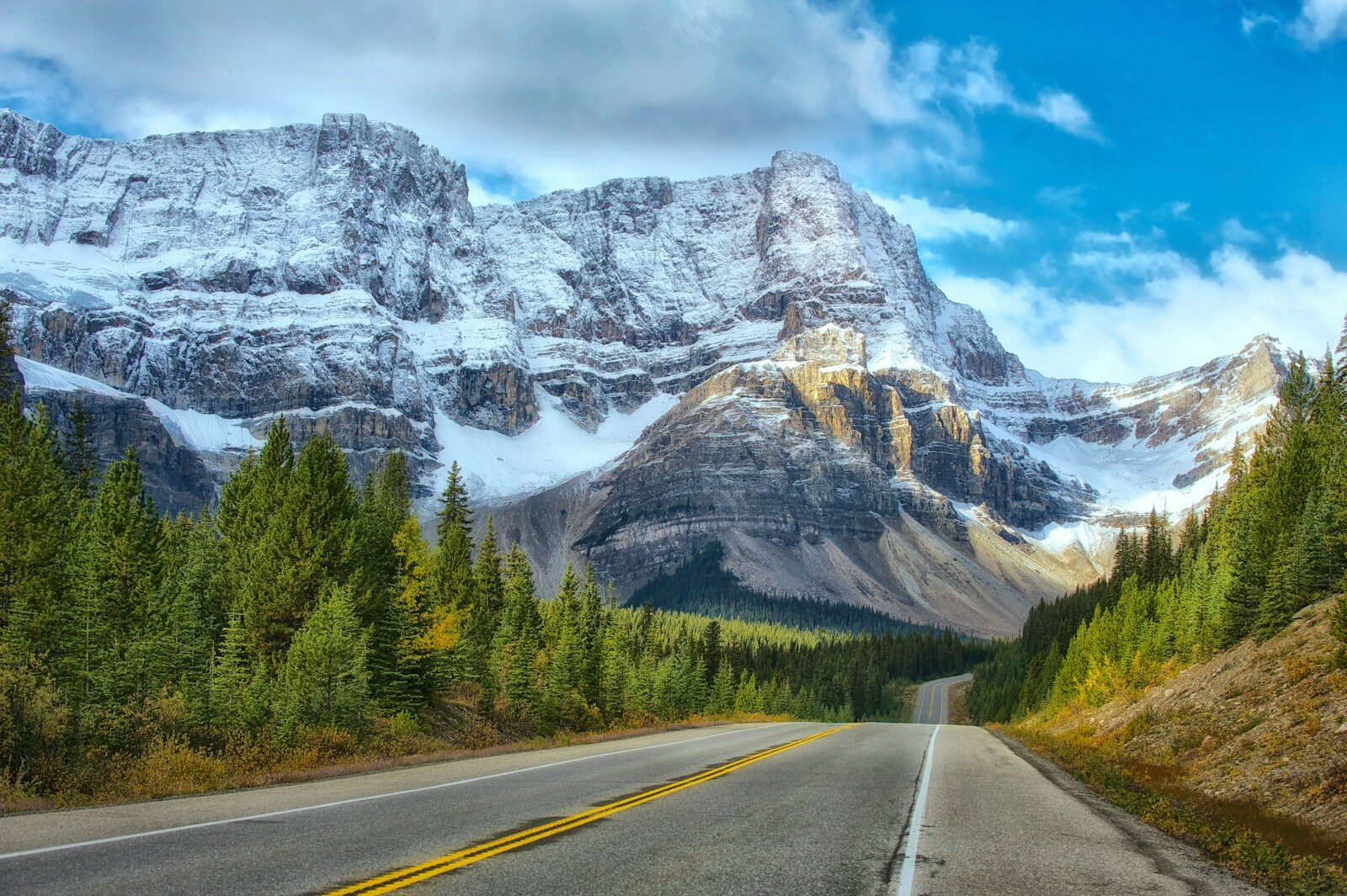 Car travelling along a scenic Canadian highway